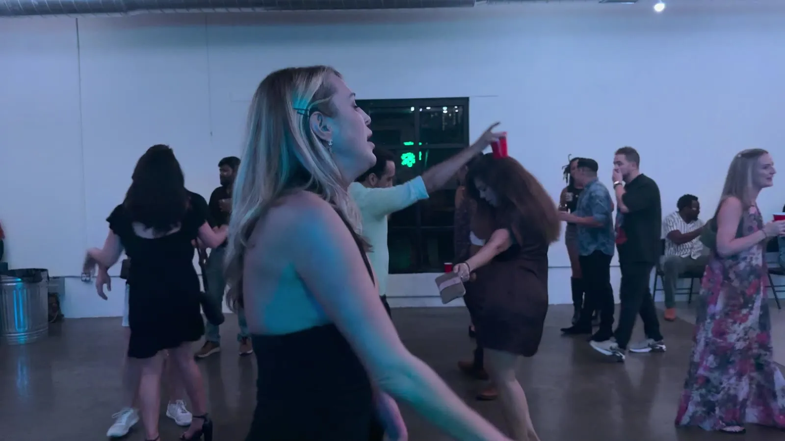 Wedding guests dancing at a Central Texas reception with DJ Lady T