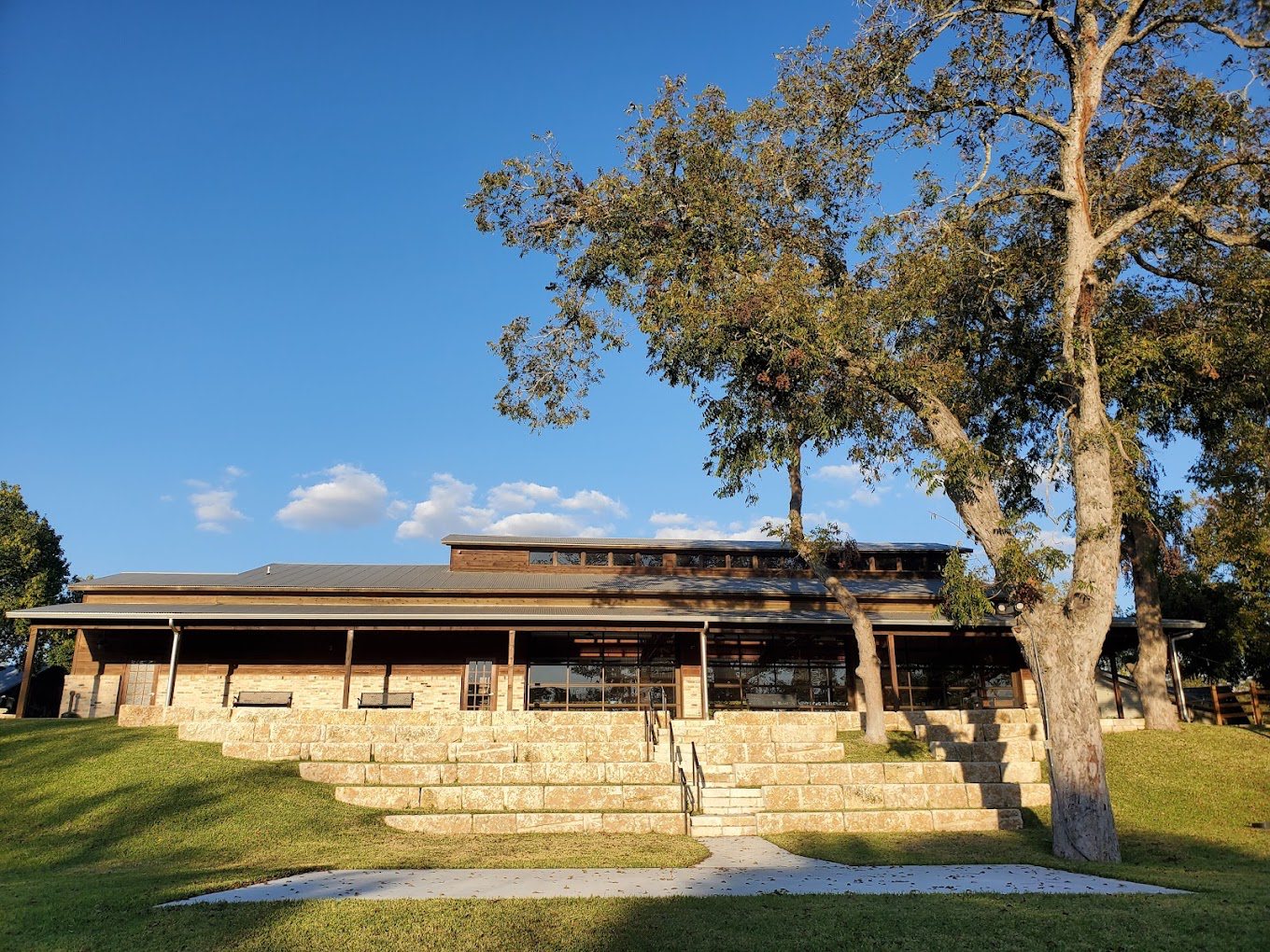Event hall and limestone terrace steps at Zedler Mill in Luling, Texas