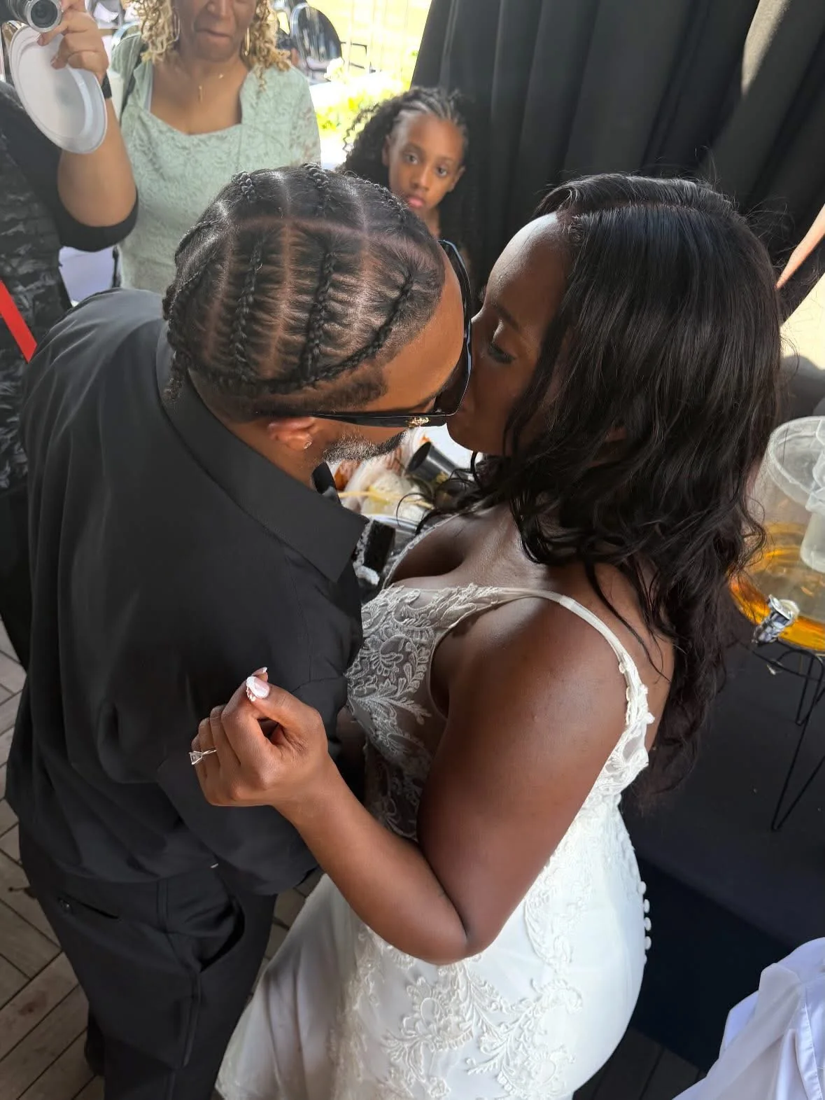 Guests celebrating at a bilingual wedding reception with DJ Lady T of Urban Opulence Entertainment