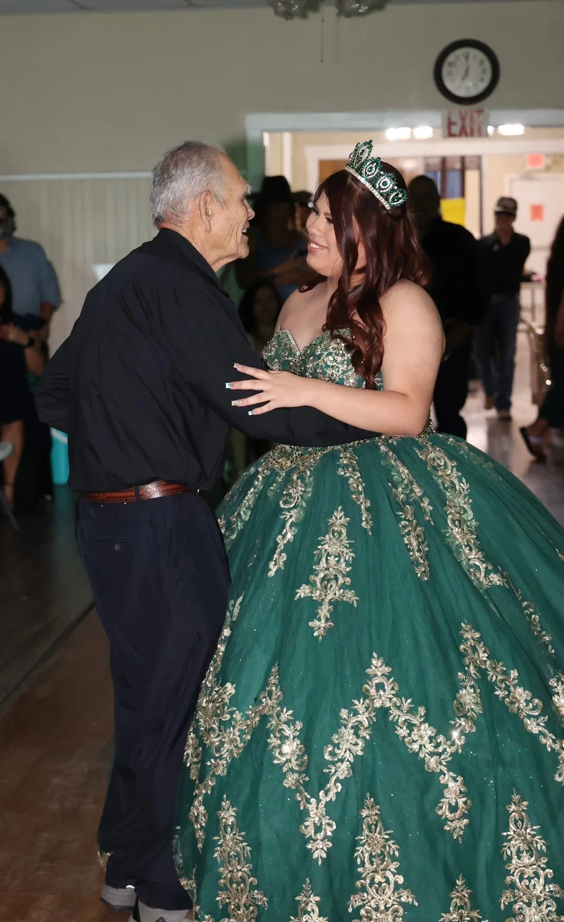 Quinceañera sharing a dance with her father at a Central Texas celebration